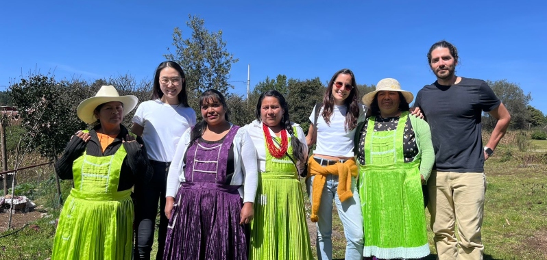 Ana de Diego (third from right) stands with women from Villa Victoria, Mexico, helping them build crop gardens.